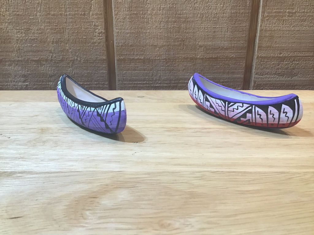 handcrafted canoes