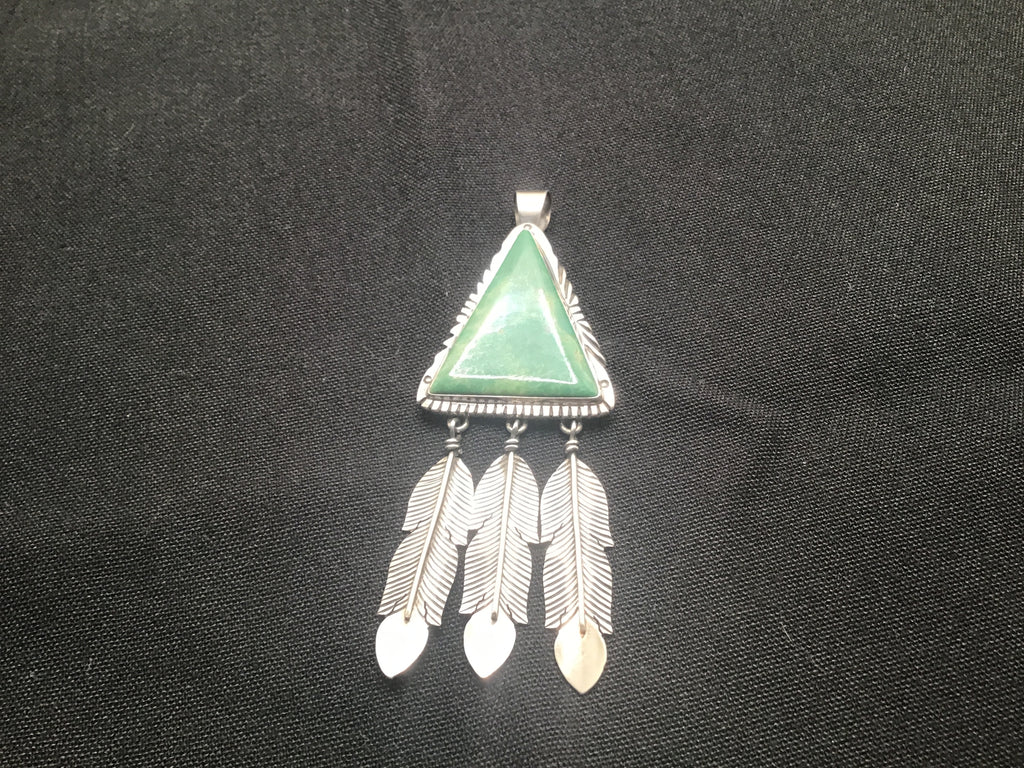 Green turquoise pendant with feathers