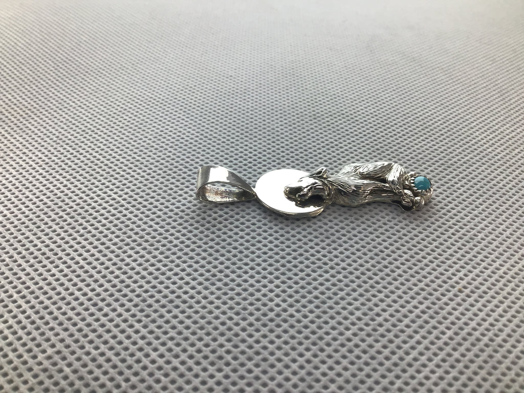 Wolf pendant with turquoise