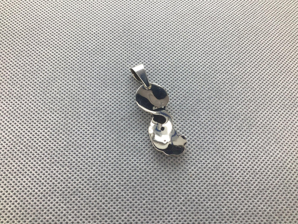 Back of wolf pendant
