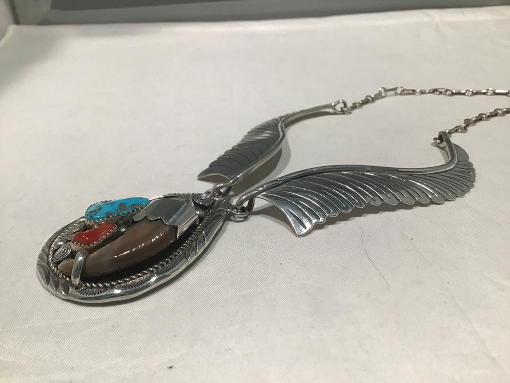 Sterling necklace with turquoise and coral with real bear claw